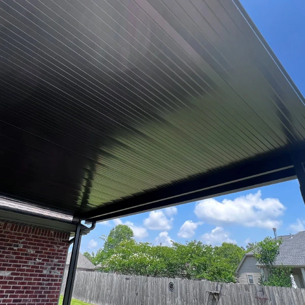 Black patio cover installation